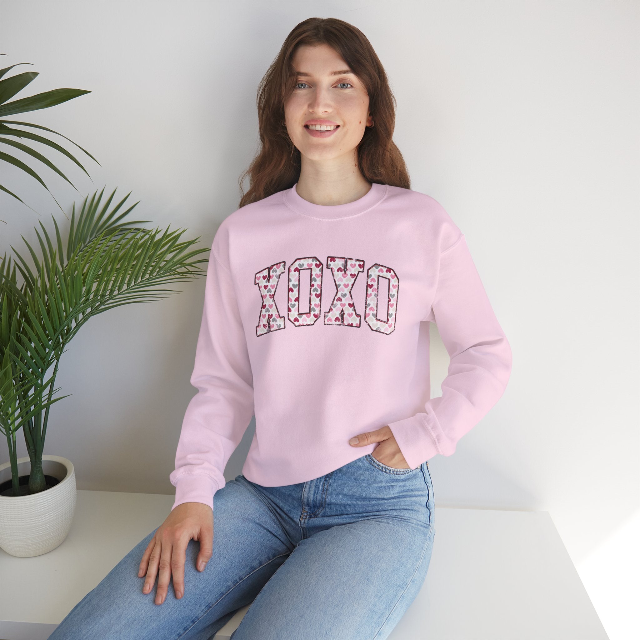 Love is in the Air: Crewneck XOXO Unisex Sweatshirt